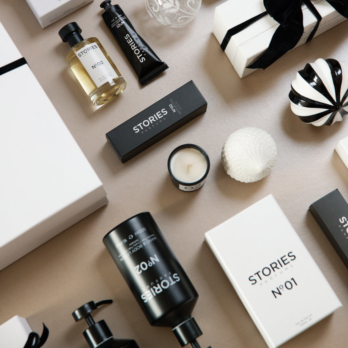 STORIES Nº.02 Hand & Body Lotion and Eau de Parfum in a Christmas flat lay